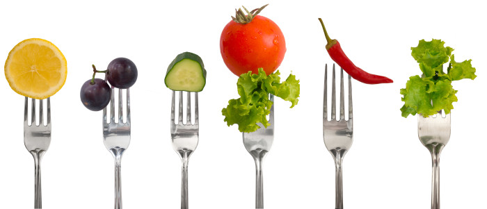 collection of forks with vegetables and fruit